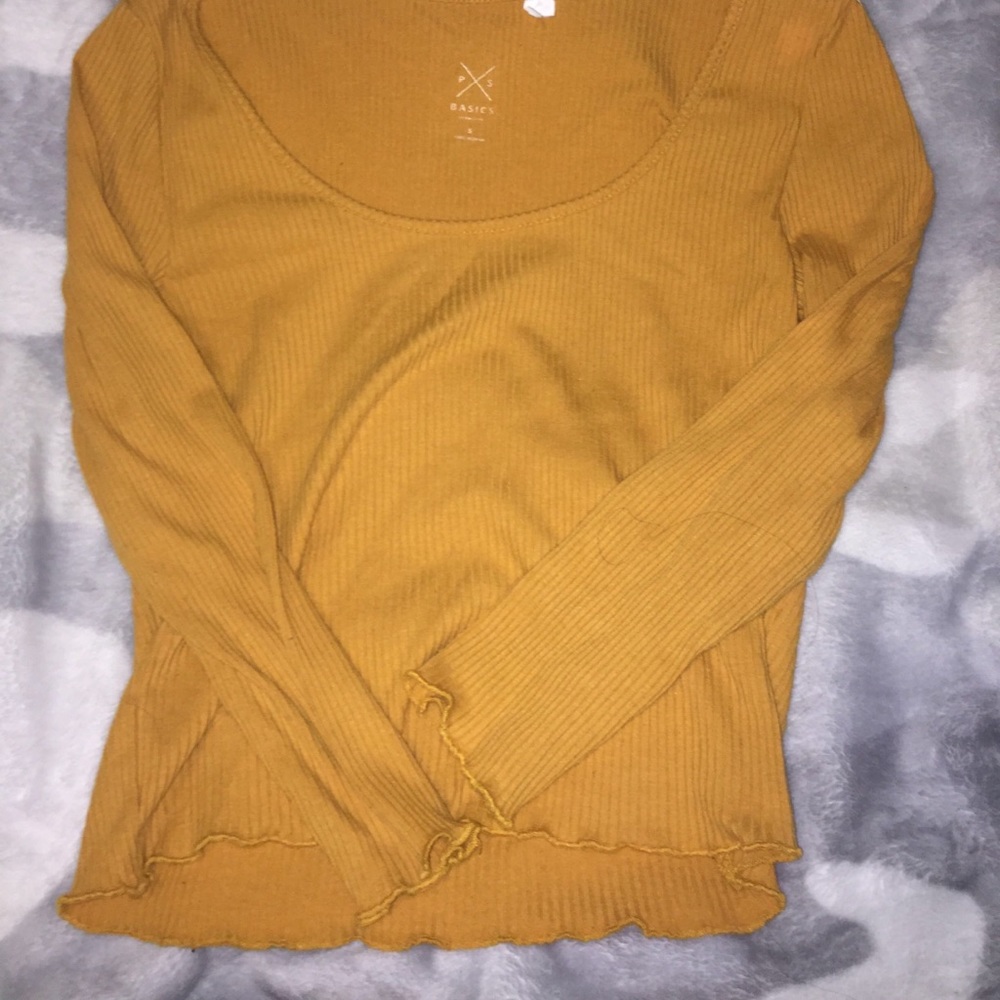 Yellow long sleeved blouse